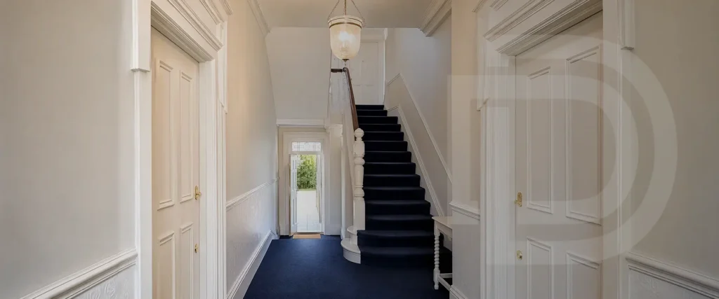 Finished internal doors and joinery beside a staircase