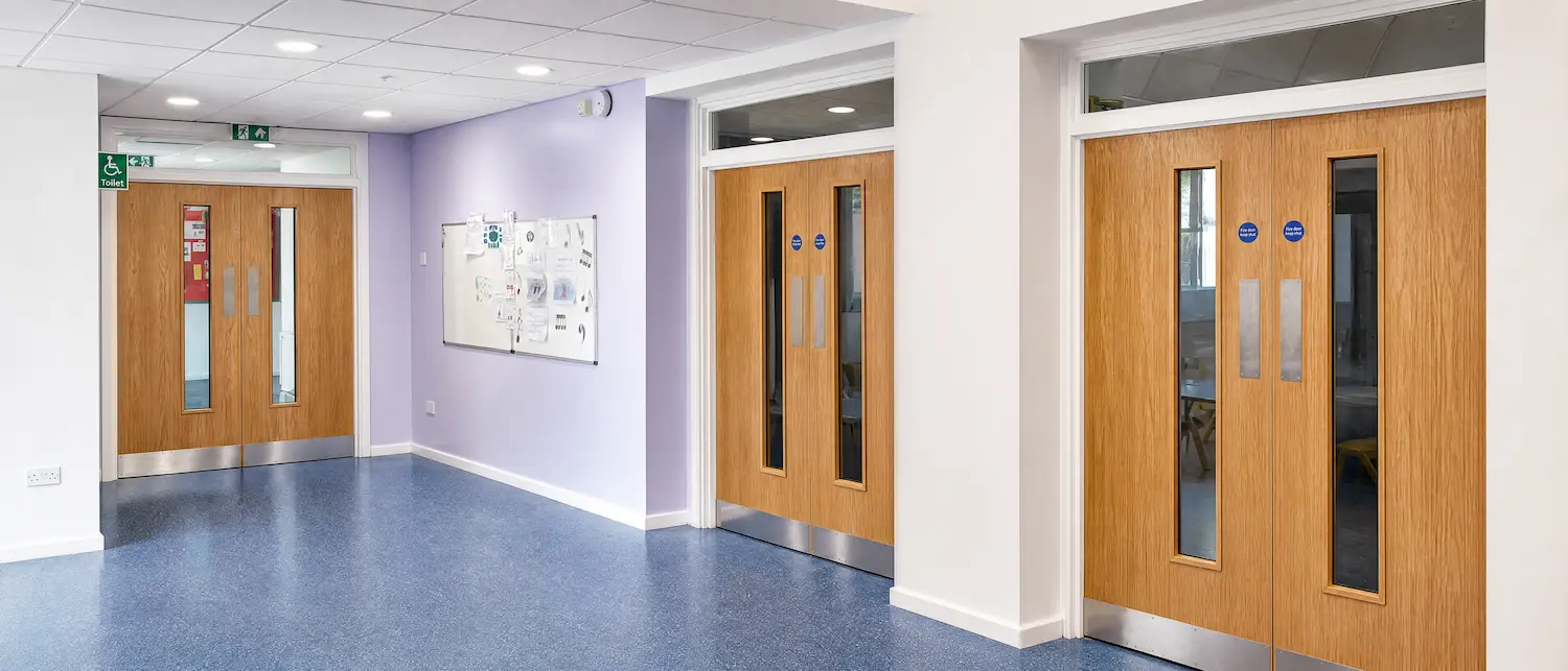Completed double fire doors inside Wickham Primary School hall